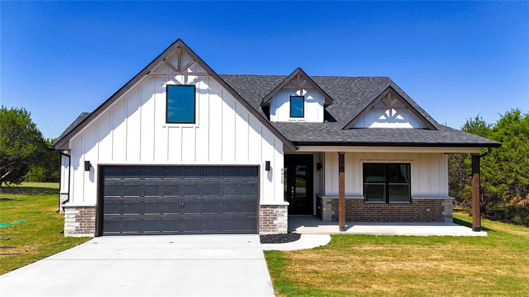 Front exterior of a new home in , Granbury, TX, highlighting curb appeal (Image 2). Front exterior of a new home in , Granbury, TX, highlighting curb appeal (Image 2).