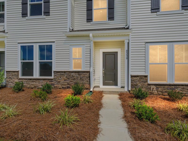 Exterior details and patio area of a home in Westwood Reserve, Charlotte (Image 3).