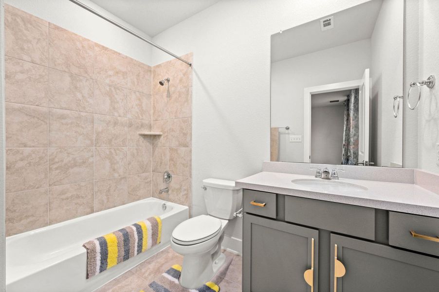 Furnished interior view inside a new home in Bluffview 50s, Leander (Image 7). Furnished interior view inside a new home in Bluffview 50s, Leander (Image 7).