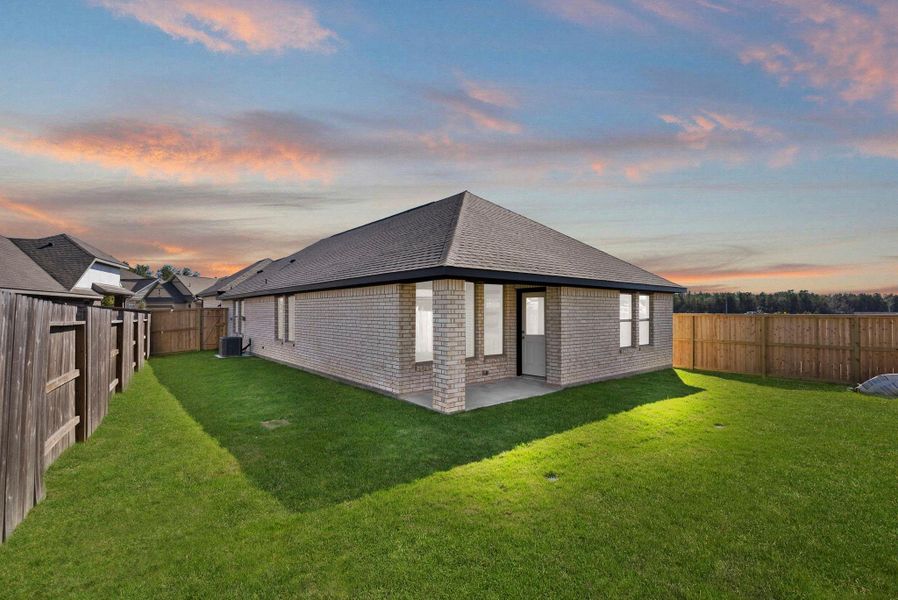 Exterior details and patio area of a home in The Trails 40', New Caney (Image 3).