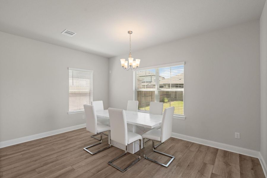 Furnished interior view inside a new home in Sunterra, Katy (Image 10).