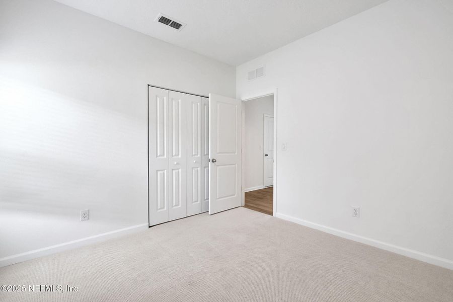 Spacious, unfurnished interior of a new home in Cordova Palms, St. Augustine (Image 23).