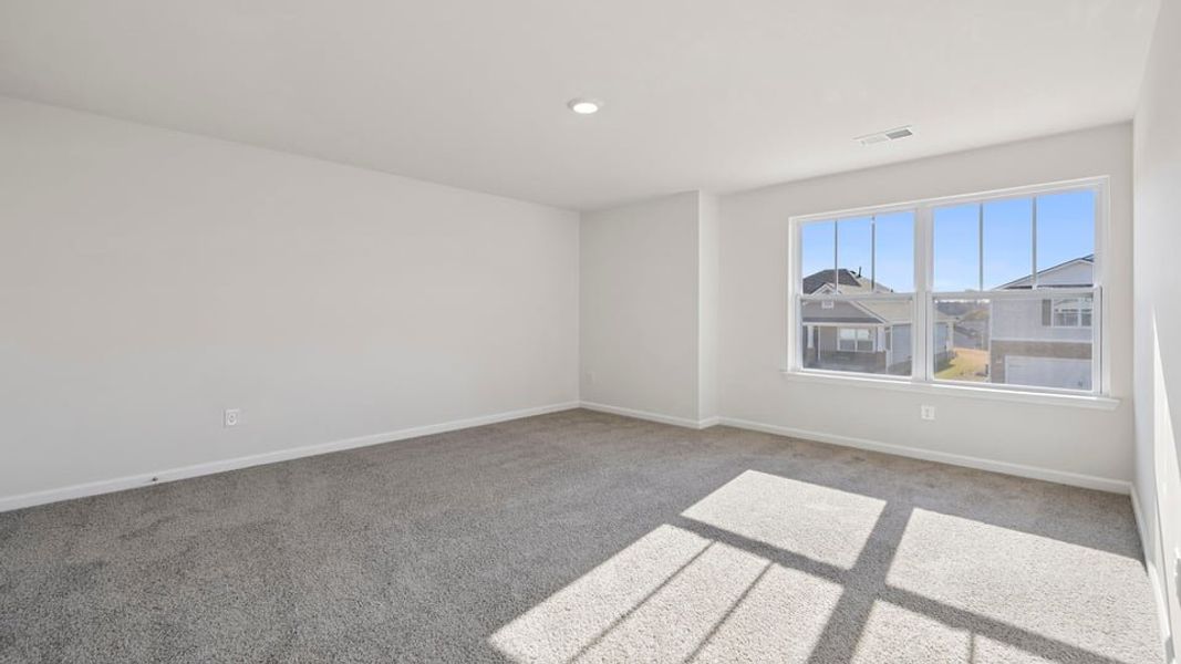 Spacious, unfurnished interior of a new home in Waverly Station, Greenwood (Image 30).