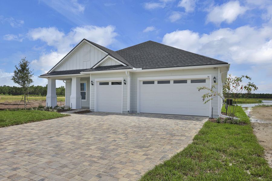 Representative exterior photo of a completed home built from the Tomoka by Riverside Homes in Hidden Creek at SilverLeaf Phase 1, St. Augustine, FL (Image 32).
