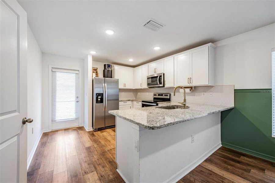Furnished interior view inside a new home in Trilby Crossing, Brooksville (Image 5).