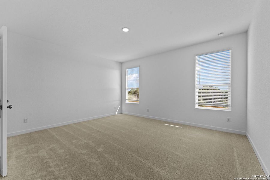 Spacious, unfurnished interior of a new home in Waterwheel: Coastline Collection, San Antonio (Image 18).