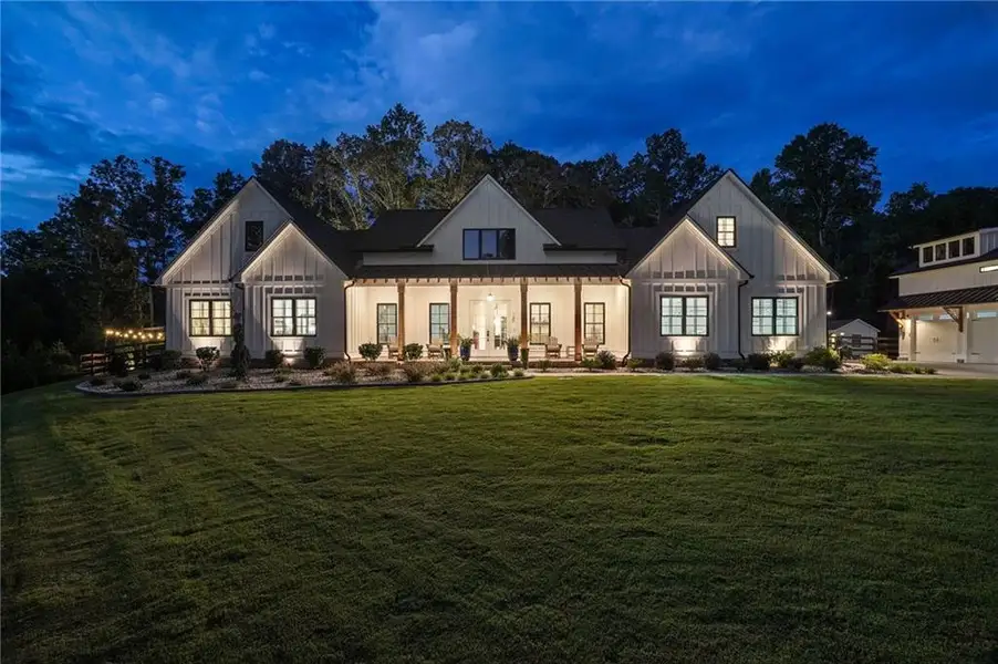 Front exterior of a new home in , Ball Ground, GA, highlighting curb appeal (Image 1). Front exterior of a new home in , Ball Ground, GA, highlighting curb appeal (Image 1).