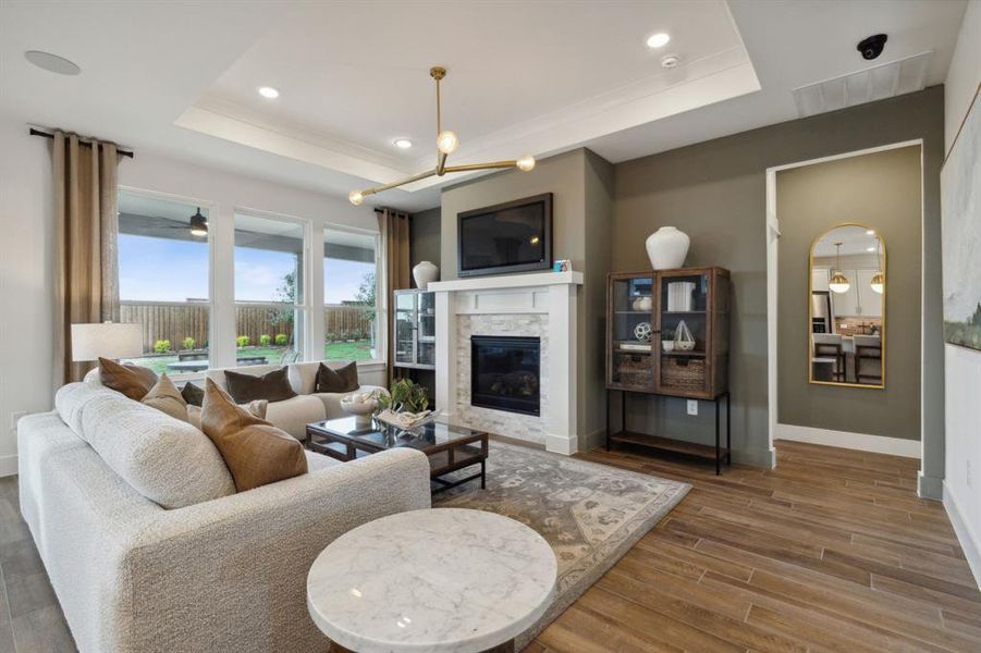 *Model Representation - Spacious gathering room with large windows