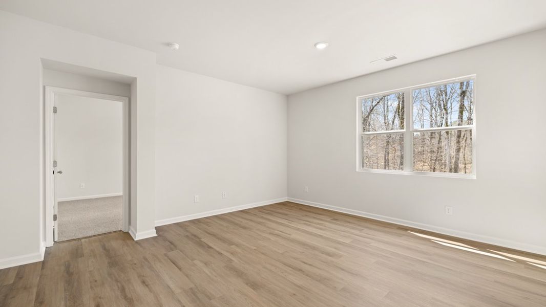 Representative unfurnished interior of a home built from the Cali by D.R. Horton in South Wind, South Fulton (Image 18).