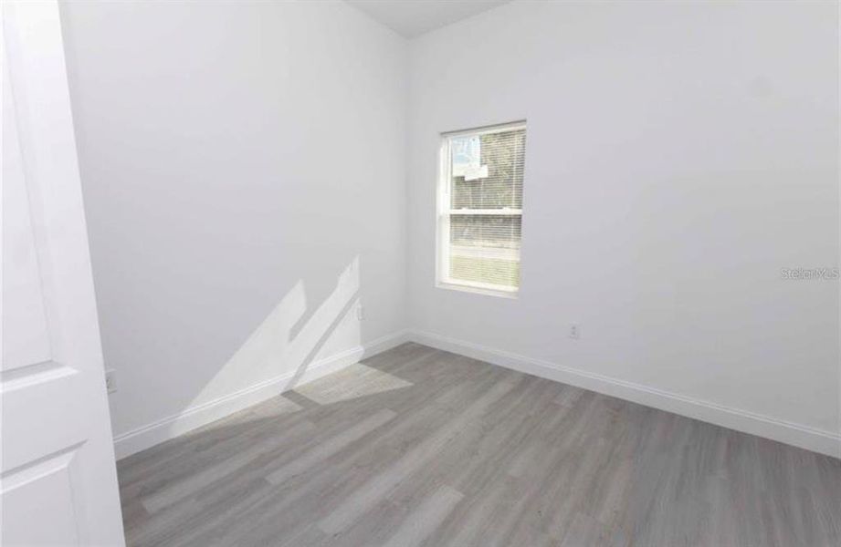 Spacious, unfurnished interior of a new home in , Lake Panasoffkee (Image 16).