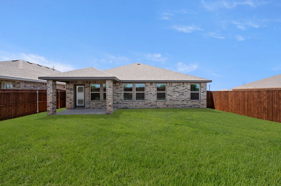 Front exterior of a new home in Baker Farms, Cleburne, TX, highlighting curb appeal (Image 25).