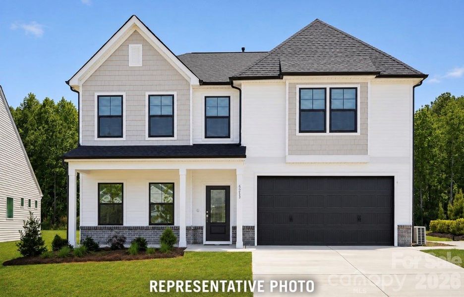 Front exterior of a new home in Clairmont, Charlotte, NC, highlighting curb appeal (Image 1). Front exterior of a new home in Clairmont, Charlotte, NC, highlighting curb appeal (Image 1).