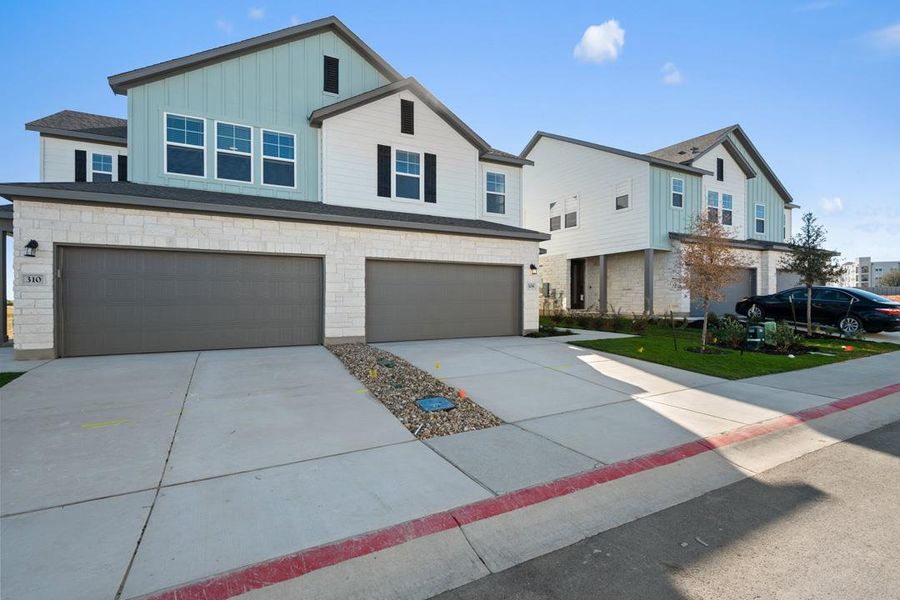 Front exterior of a new home in Union Collection at Park Central, Georgetown, TX, highlighting curb appeal (Image 22). Front exterior of a new home in Union Collection at Park Central, Georgetown, TX, highlighting curb appeal (Image 22).