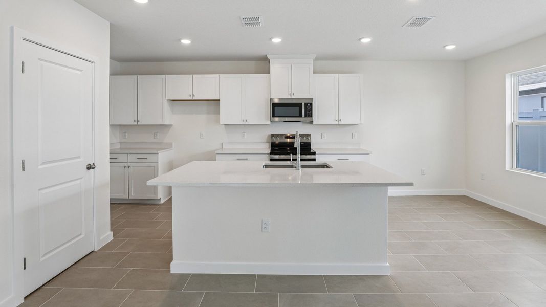 Furnished interior view inside a new home in Cyrene at Harmony, St. Cloud (Image 9).