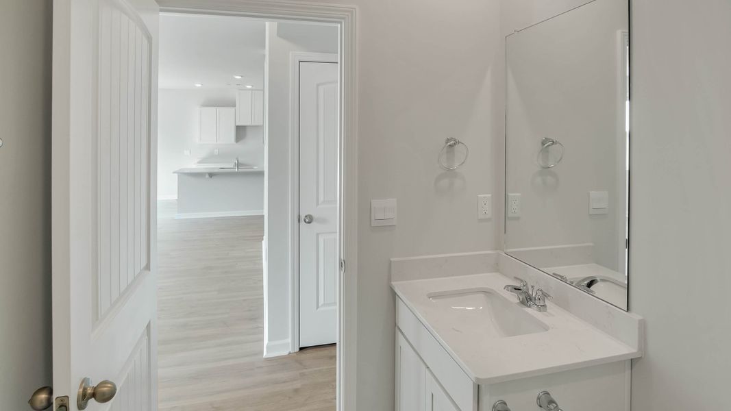 Furnished interior view inside a new home in The Parks, White House (Image 10).