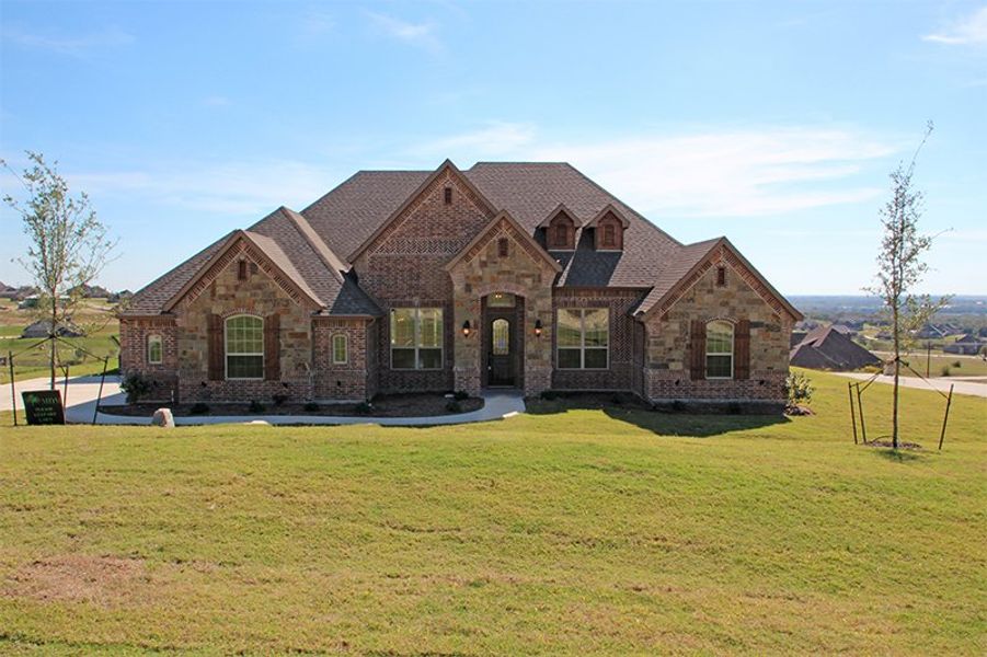 Representative exterior photo of a completed home built from the Lexington II by Our Country Homes in NorthGlen, Haslet, TX (Image 7).