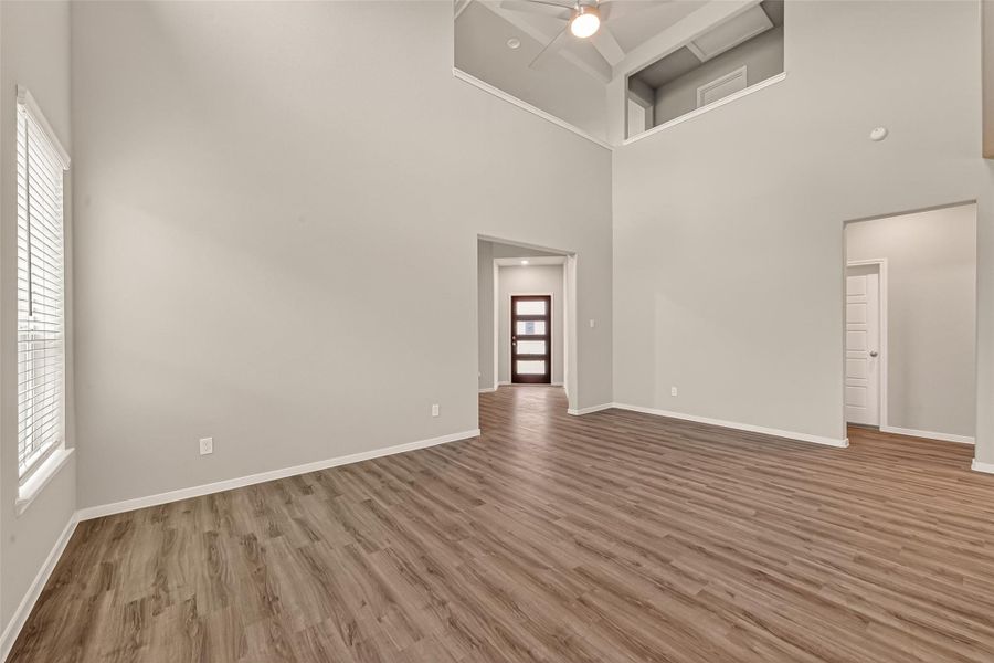 Spacious, unfurnished interior of a new home in Sunterra, Katy (Image 19).