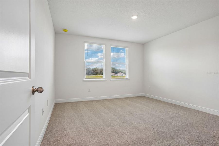 Spacious, unfurnished interior of a new home in The Reserve at Hammock Oaks - Classic Series, Lady Lake (Image 32). Spacious, unfurnished interior of a new home in The Reserve at Hammock Oaks - Classic Series, Lady Lake (Image 32).