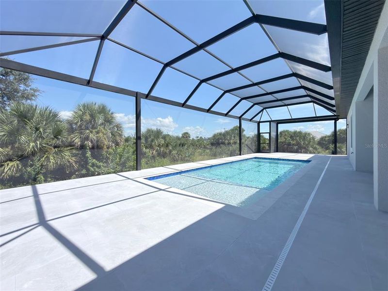 Exterior details and patio area of a home in , Port Charlotte (Image 25).
