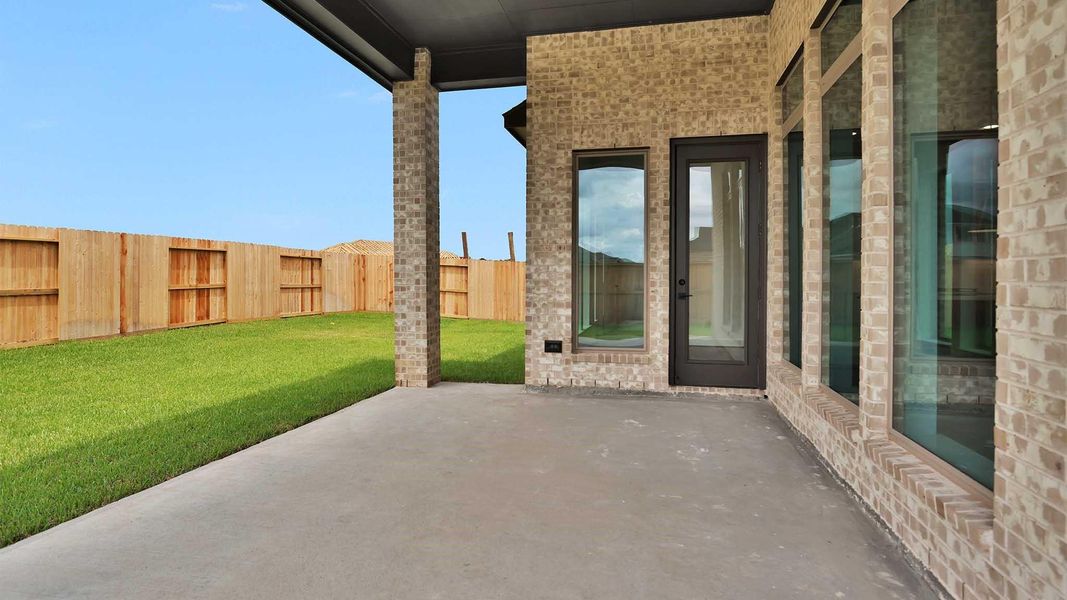 Exterior details and patio area of a home in Sienna, Missouri City (Image 3). Exterior details and patio area of a home in Sienna, Missouri City (Image 3).