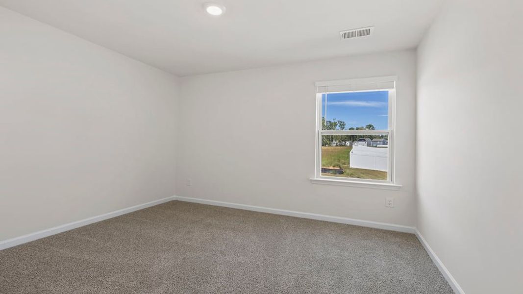 Spacious, unfurnished interior of a new home in Varner Station, Woodruff (Image 24).