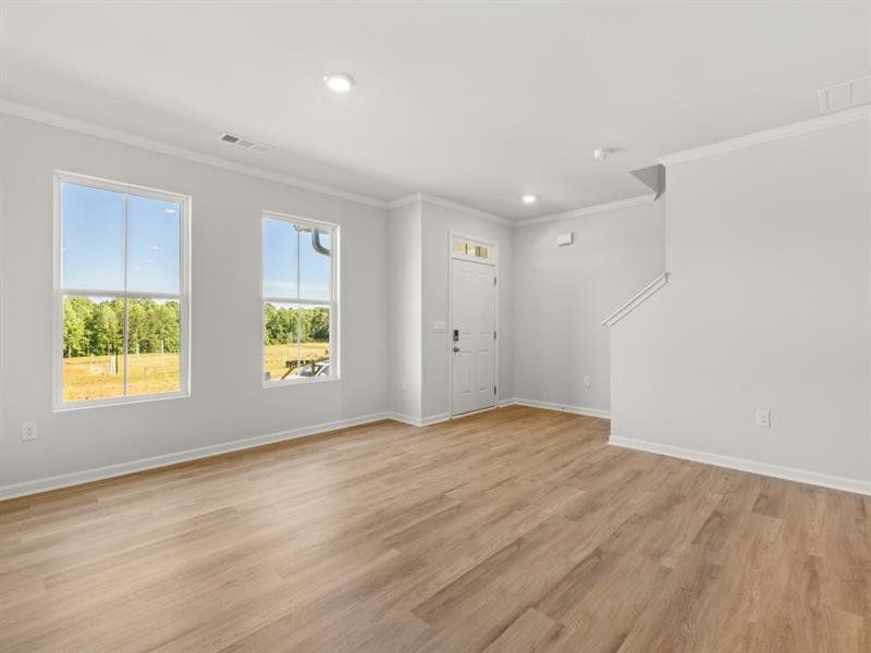 Spacious, unfurnished interior of a new home in Waypoint, Flowery Branch (Image 16).
