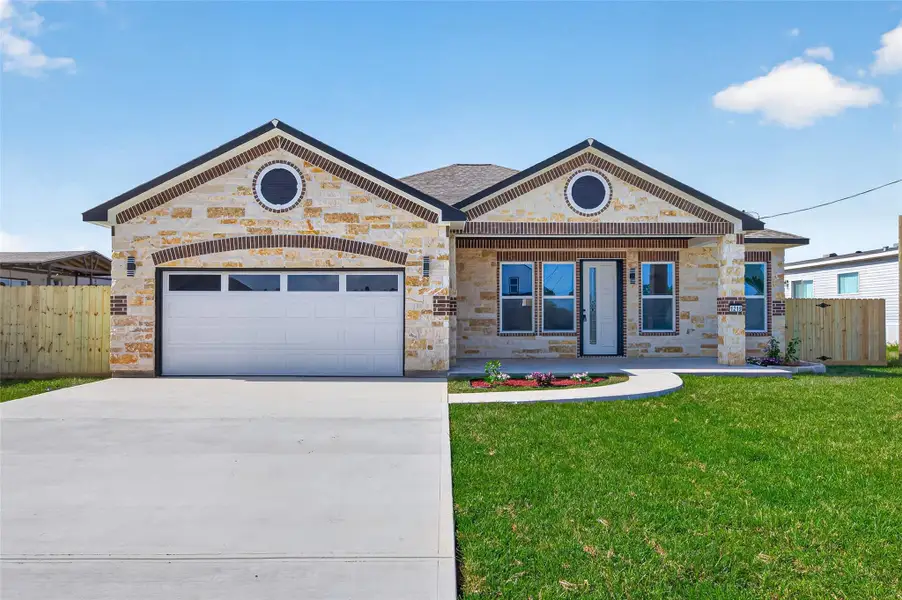 Custom single-story home featuring a welcoming front porch, attractive curb appeal, and quality exterior finishes. Custom single-story home featuring a welcoming front porch, attractive curb appeal, and quality exterior finishes.