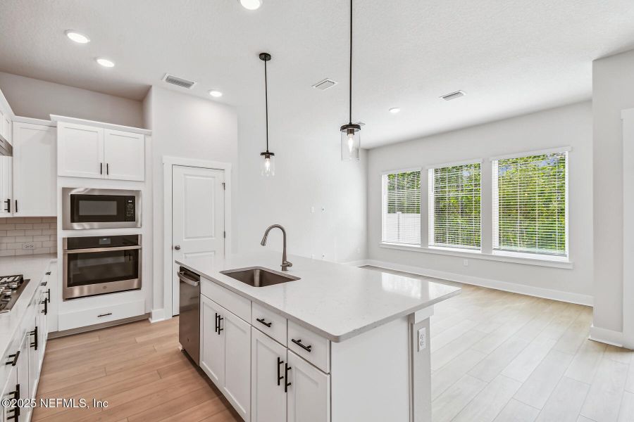 Furnished interior view inside a new home in Kettering at eTown - Paired Villas, Jacksonville (Image 3).