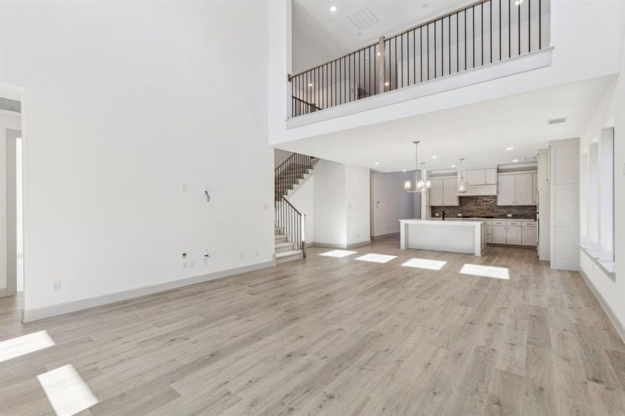 With the upstairs game room open the main family room, you'll enjoy multi-level entertaining in our Percy plan. With the upstairs game room open the main family room, you'll enjoy multi-level entertaining in our Percy plan.