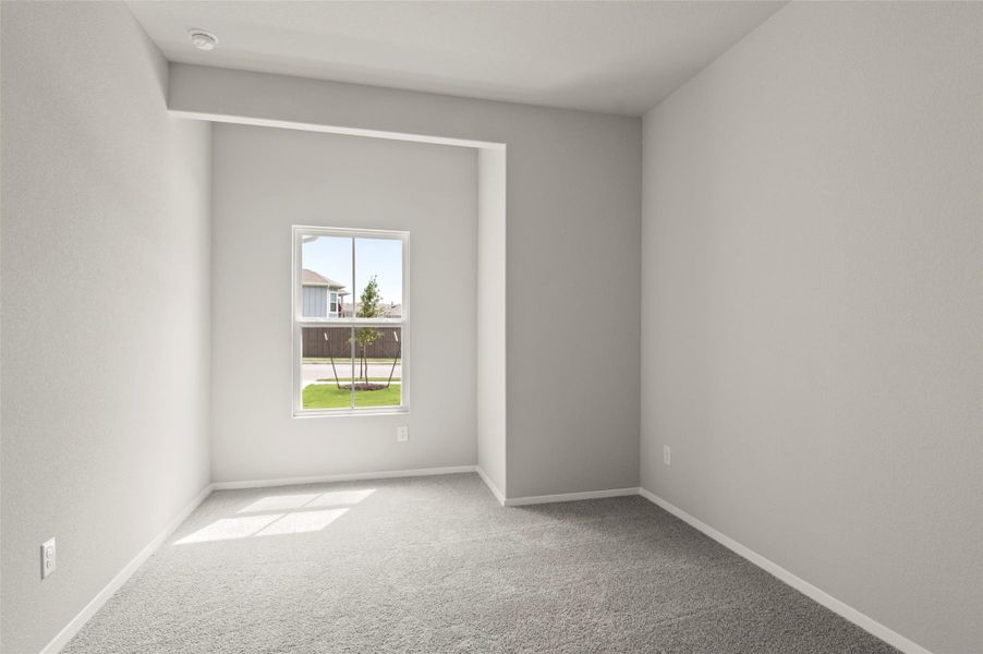 Unfurnished room with carpet floors and baseboards