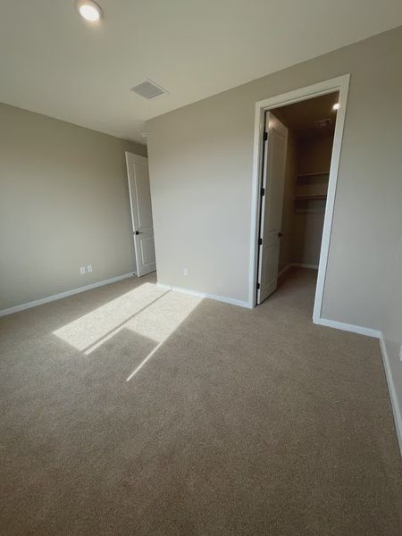 Spacious, unfurnished interior of a new home in Acacia at Santana, Yuma (Image 8).