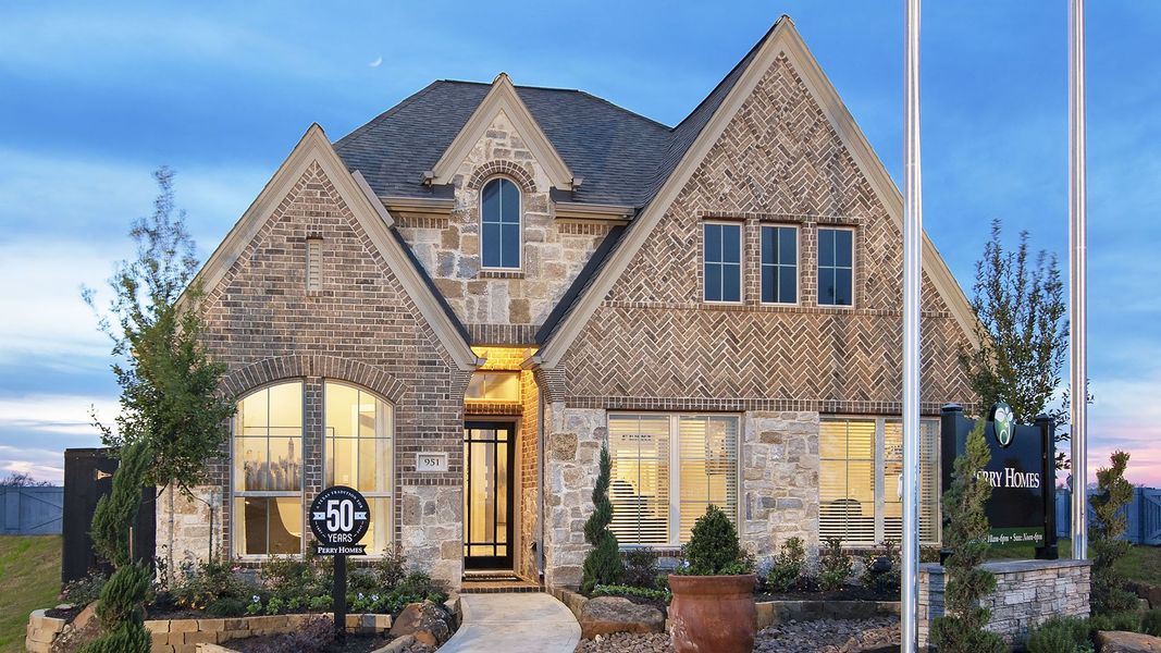 Front exterior of a new home in Briggs Ranch, San Antonio, TX, highlighting curb appeal (Image 26).
