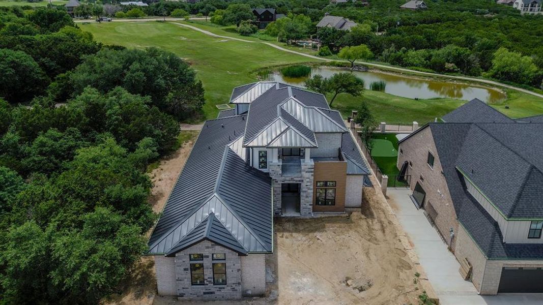 Front exterior of a new home in , Graford, TX, highlighting curb appeal (Image 15). Front exterior of a new home in , Graford, TX, highlighting curb appeal (Image 15).