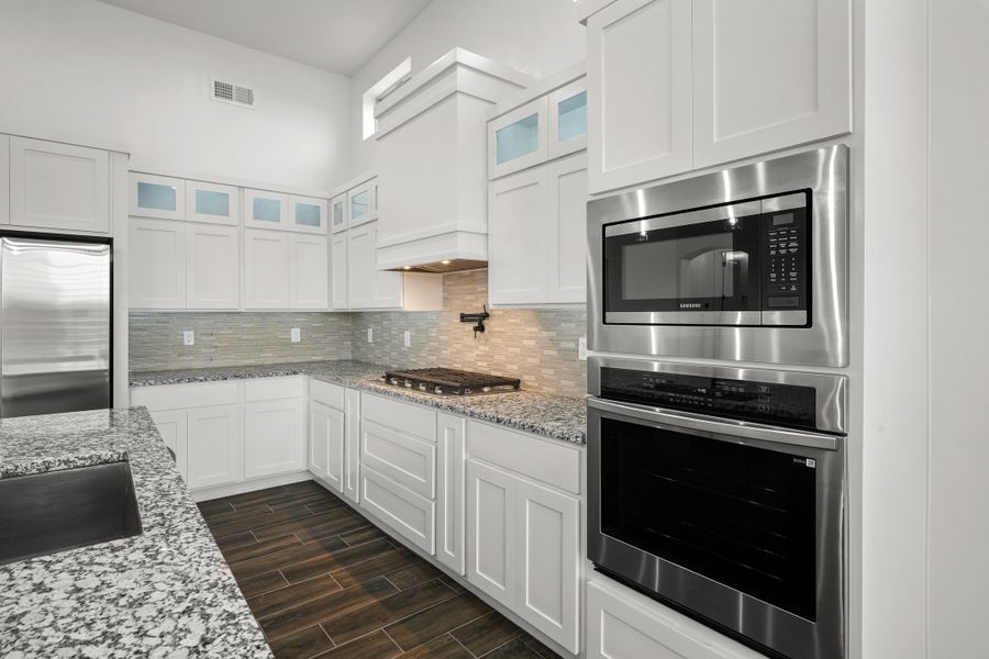 Representative furnished interior of a home built from the Scottsdale by LEH. Homes in Verdancia, El Paso (Image 14).