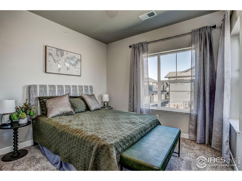 Furnished interior view inside a new home in The Lakes at Centerra - Discovery, Loveland (Image 21).