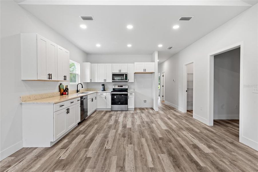 Kitchen with stainless-steel appliances