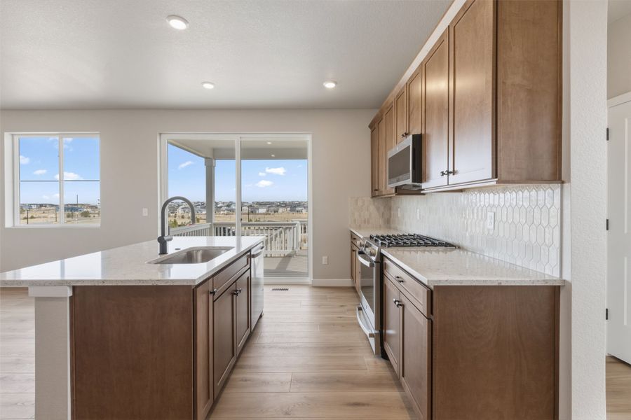 Furnished interior view inside a new home in The Aurora Highlands, Aurora (Image 7).