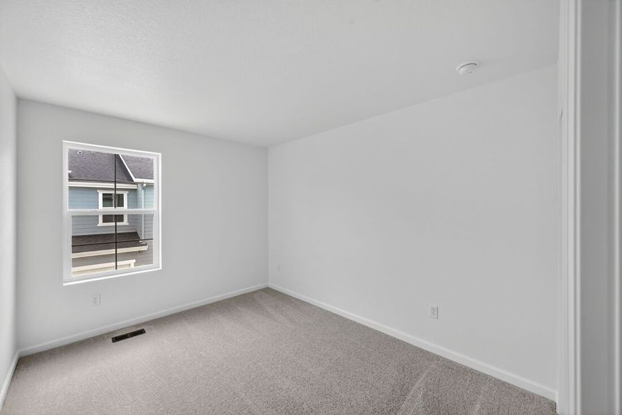 Spacious, unfurnished interior of a new home in Trailstone, Arvada (Image 13).