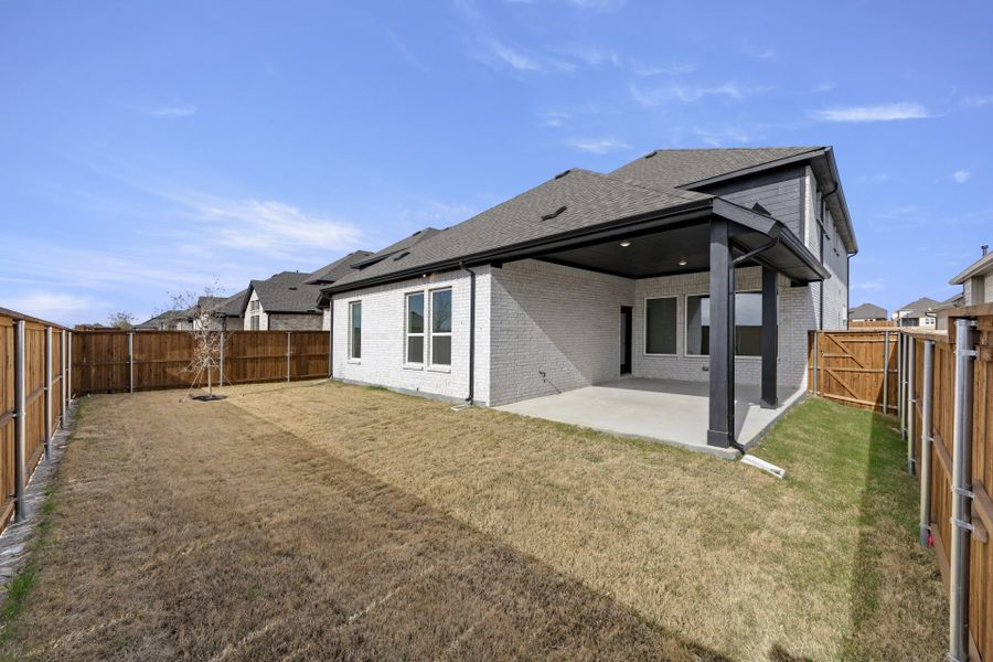Exterior details and patio area of a home in Sutton Fields, Celina (Image 18).