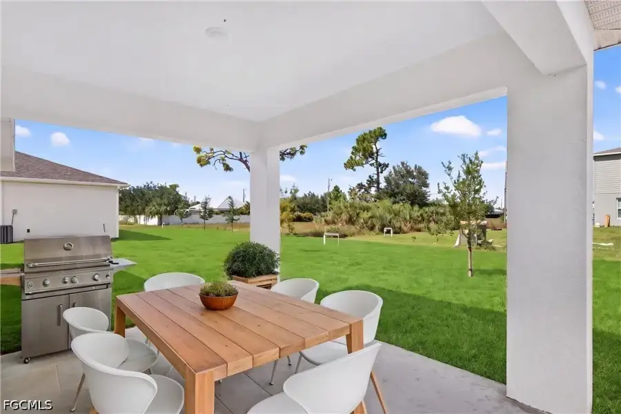 Exterior details and patio area of a home in Cape Coral, Cape Coral (Image 3).