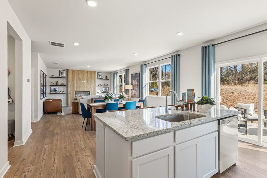 A kitchen with a large island. A kitchen with a large island.