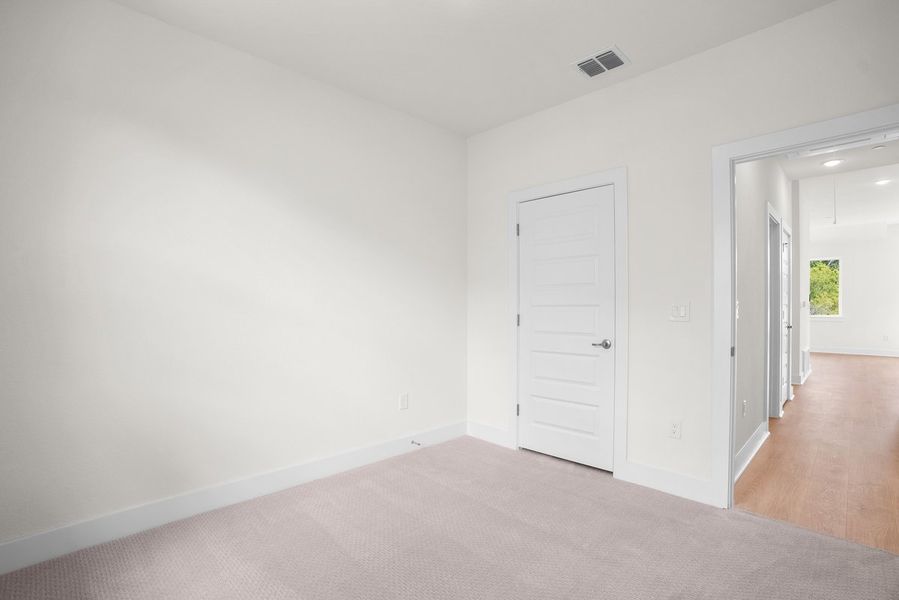Spacious, unfurnished interior of a new home in Koenig Townhomes, Austin (Image 13). Spacious, unfurnished interior of a new home in Koenig Townhomes, Austin (Image 13).