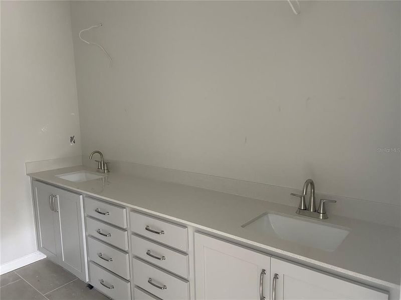 In-progress construction of a new home in Oakfield Trails Signature, Parrish, FL (Image 16).