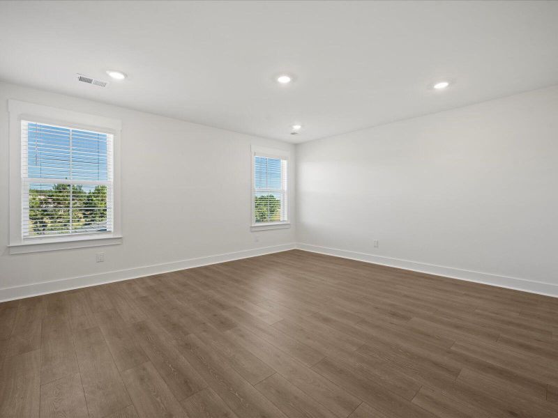 Spacious, unfurnished interior of a new home in The Coves at Lakes of Cane Bay, Summerville (Image 20). Spacious, unfurnished interior of a new home in The Coves at Lakes of Cane Bay, Summerville (Image 20).