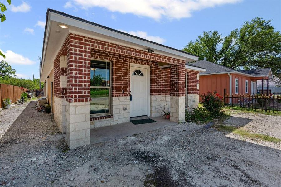 Single story home with brick siding Single story home with brick siding