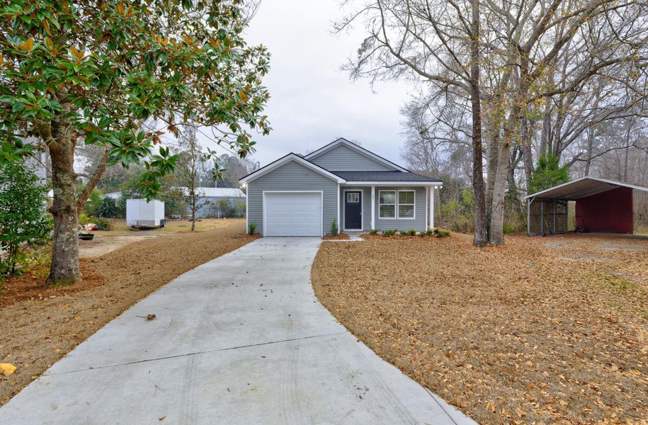 Front exterior of a new home in , Summerville, SC, highlighting curb appeal (Image 21).