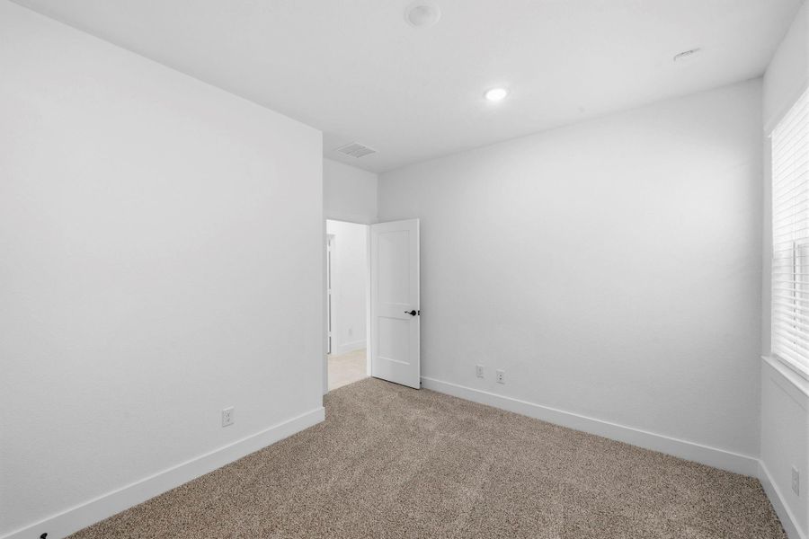 Spacious, unfurnished interior of a new home in Bridgeland, Cypress (Image 13).