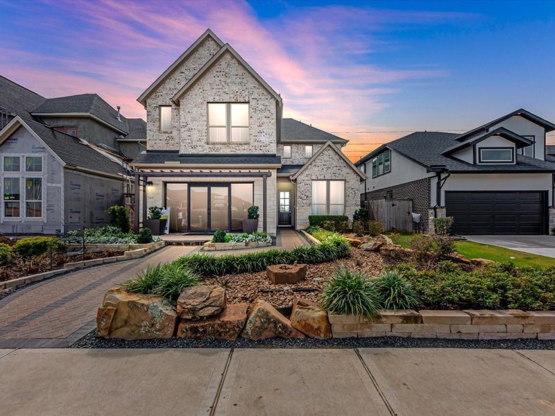 Front exterior of a new home in Garden Glen at Clopton Farms, Montgomery, TX, highlighting curb appeal (Image 1).