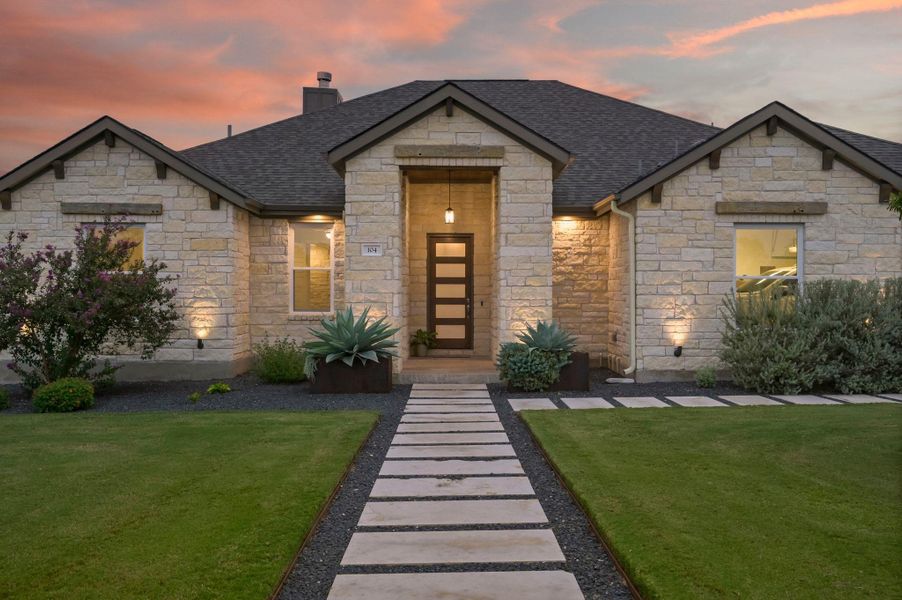 Front exterior of a new home in , Georgetown, TX, highlighting curb appeal (Image 21).