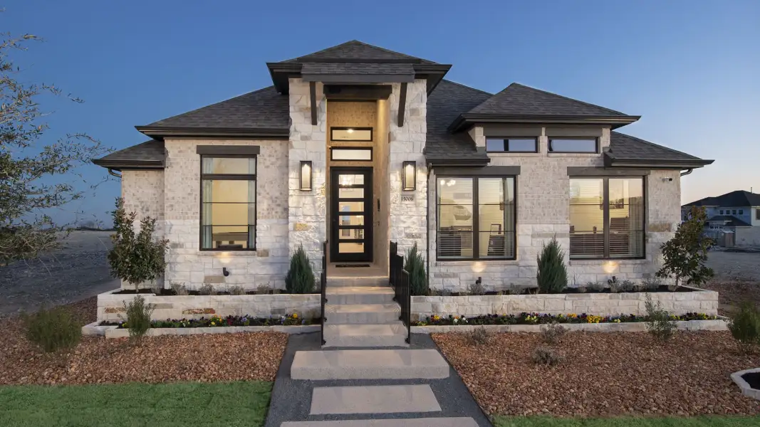 Front exterior of a new home in Canyon Falls, Northlake, TX, highlighting curb appeal (Image 21).